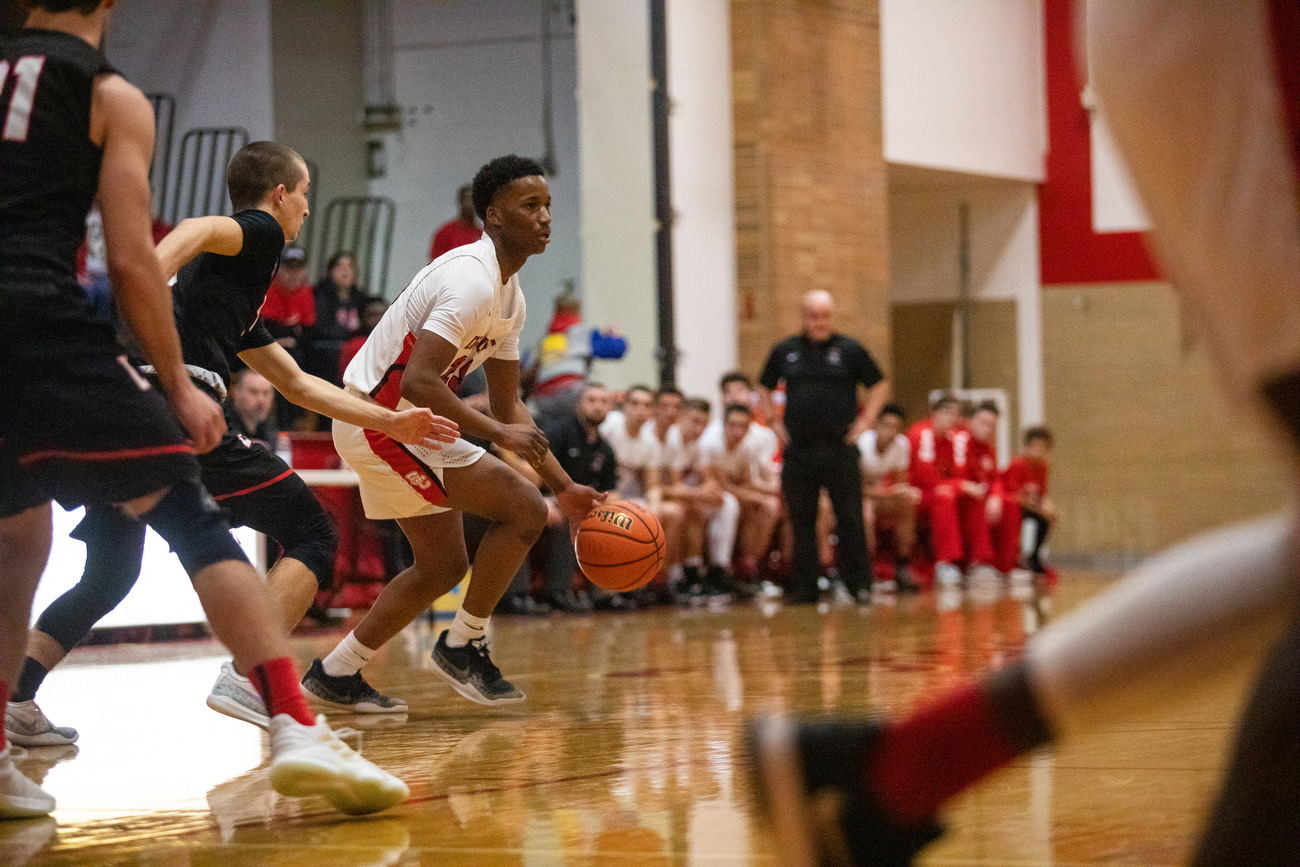 Linden boys basketball defeats Swartz Creek