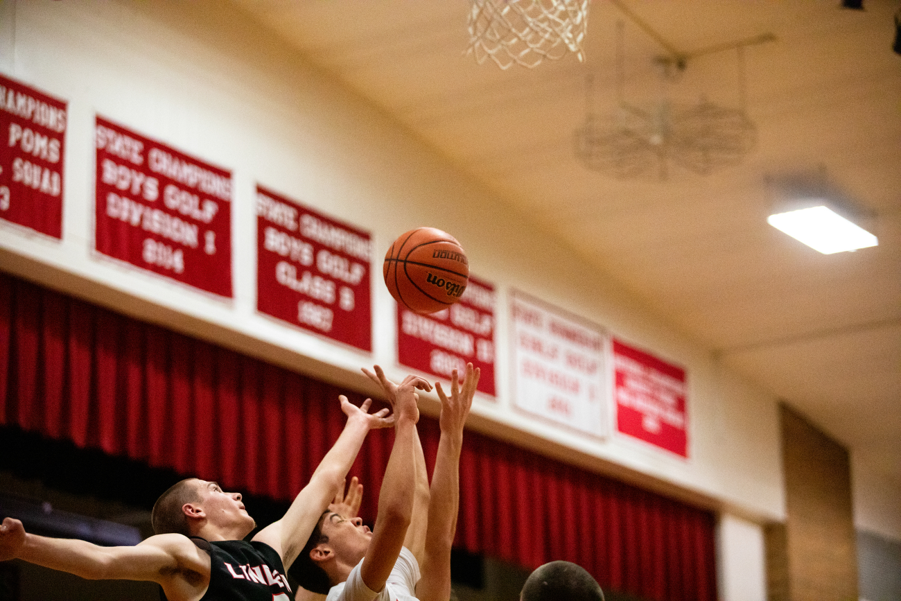 Linden boys basketball defeats Swartz Creek