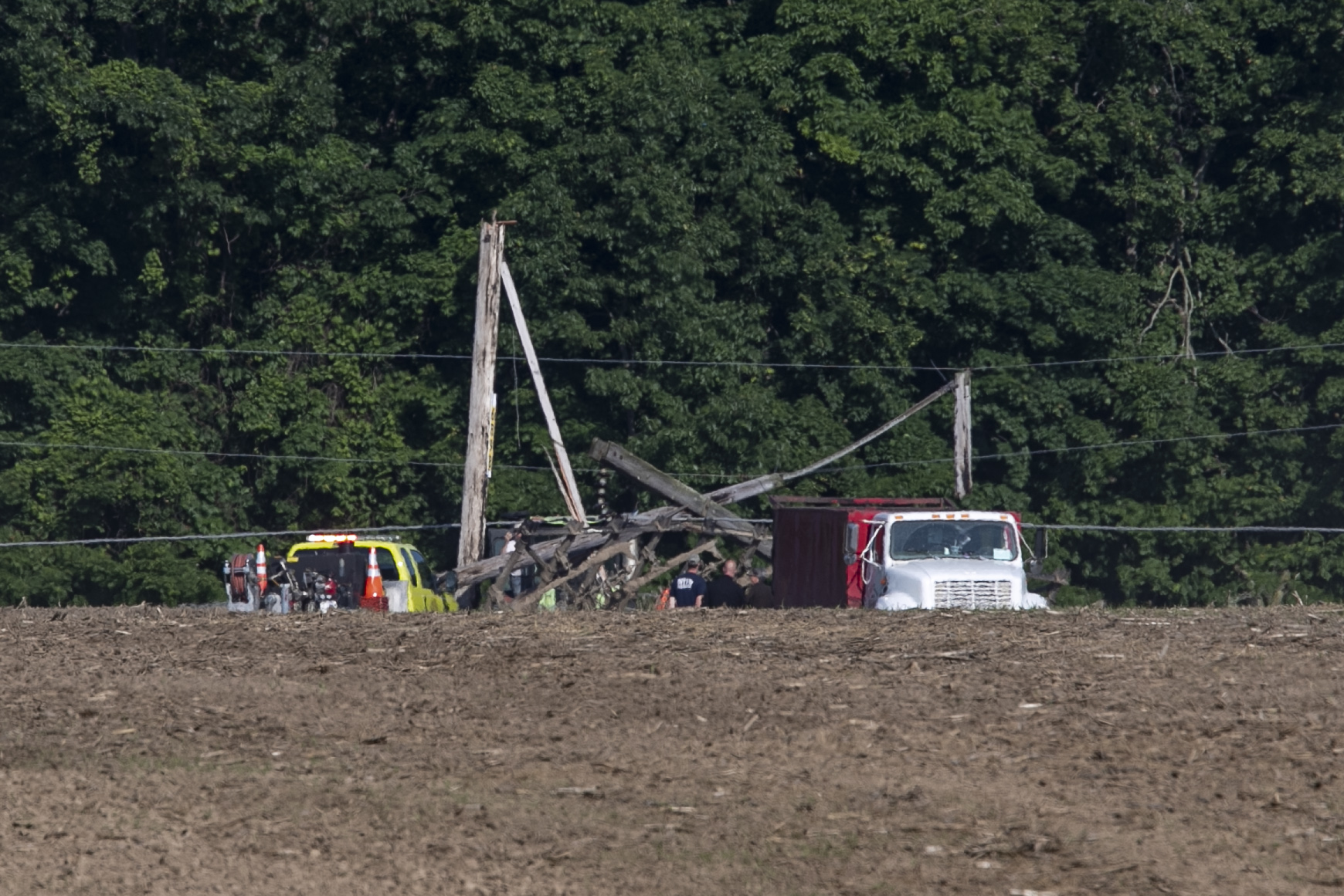 Farmer trapped after power lines fall on tractor - mlive.com