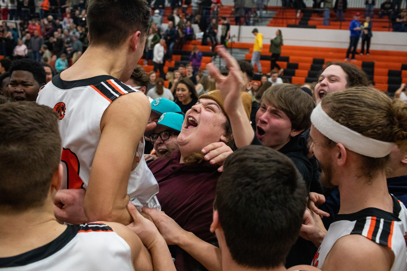 Clio boys basketball celebrates win on senior night