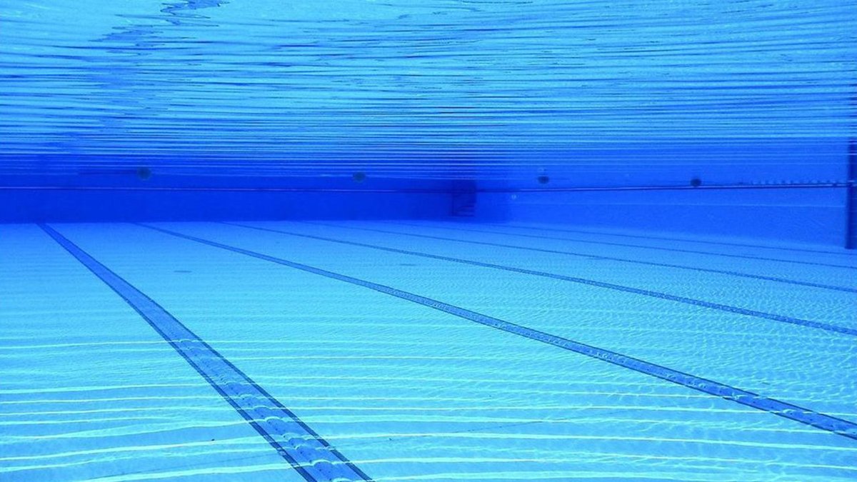 Poop parasite in pools sickening more people as swimming season heats