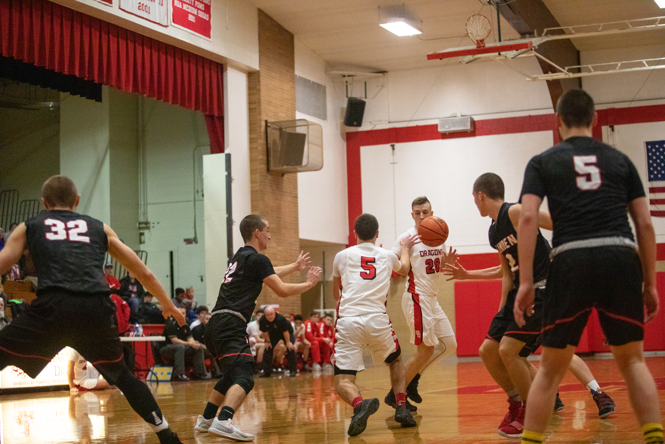 Linden boys basketball defeats Swartz Creek