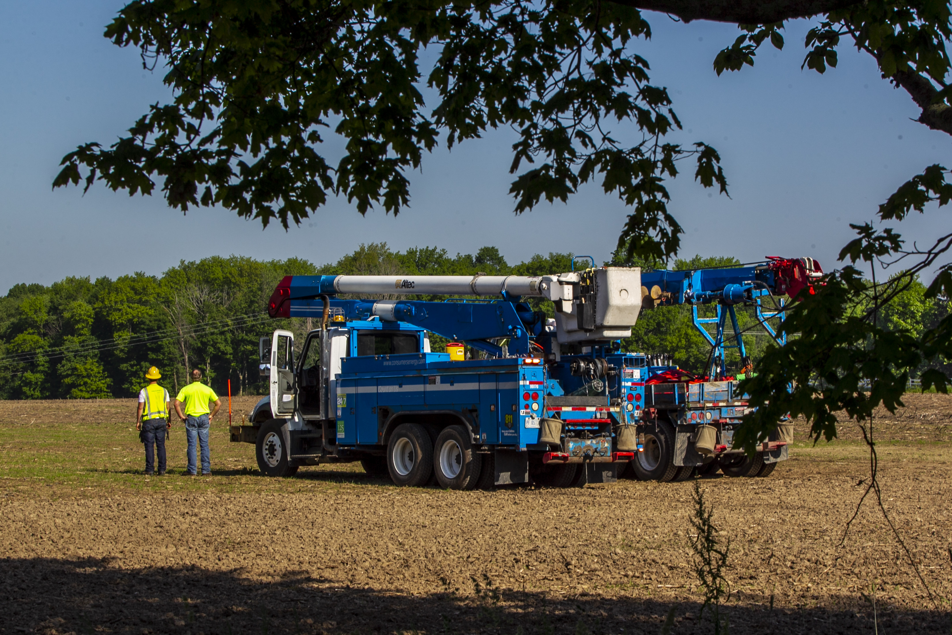 Farmer trapped after power lines fall on tractor - mlive.com