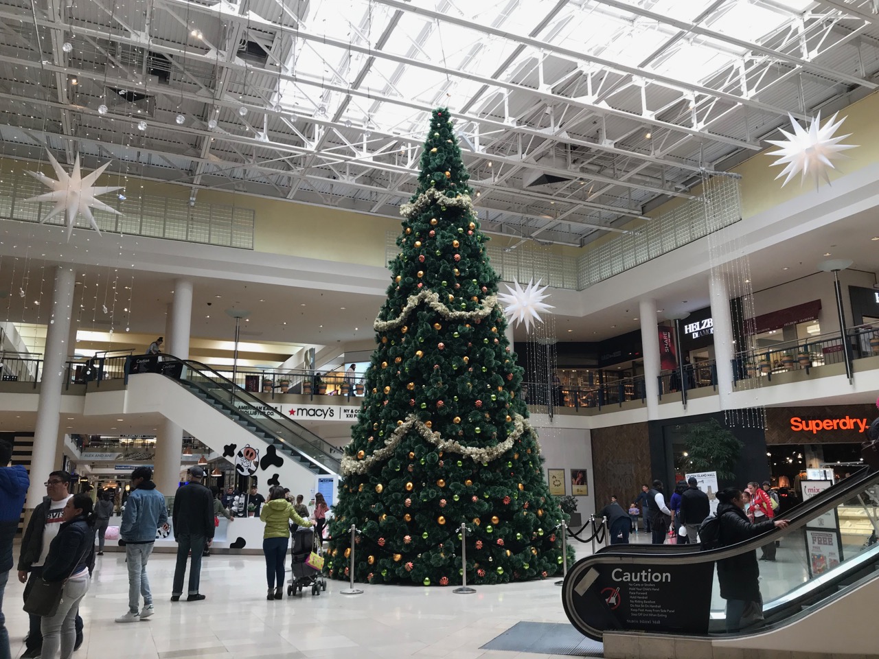 Christmas trees light up inside, outside of Staten Island Mall