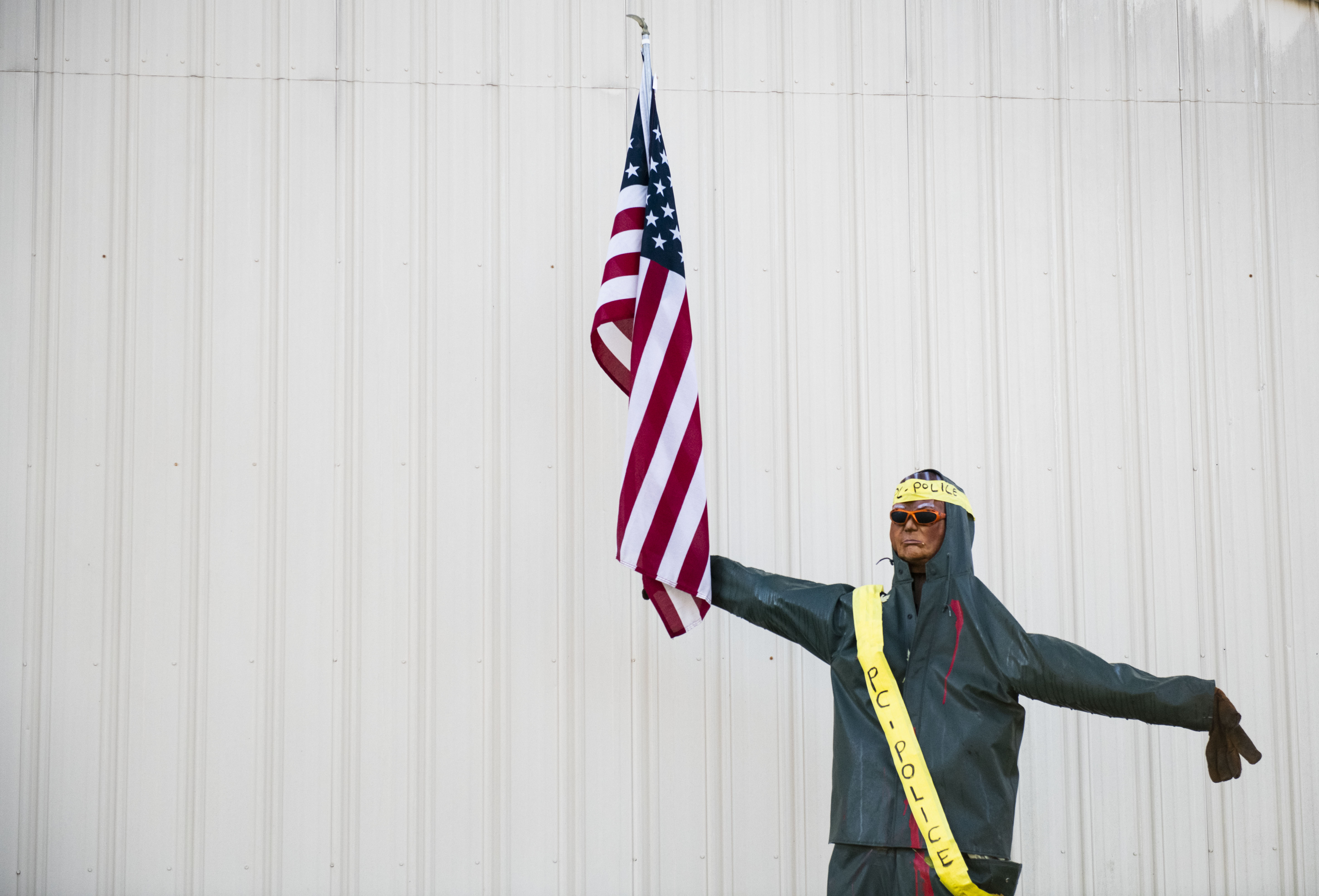 Scarecrow of President Trump outside local business in Fowlerville