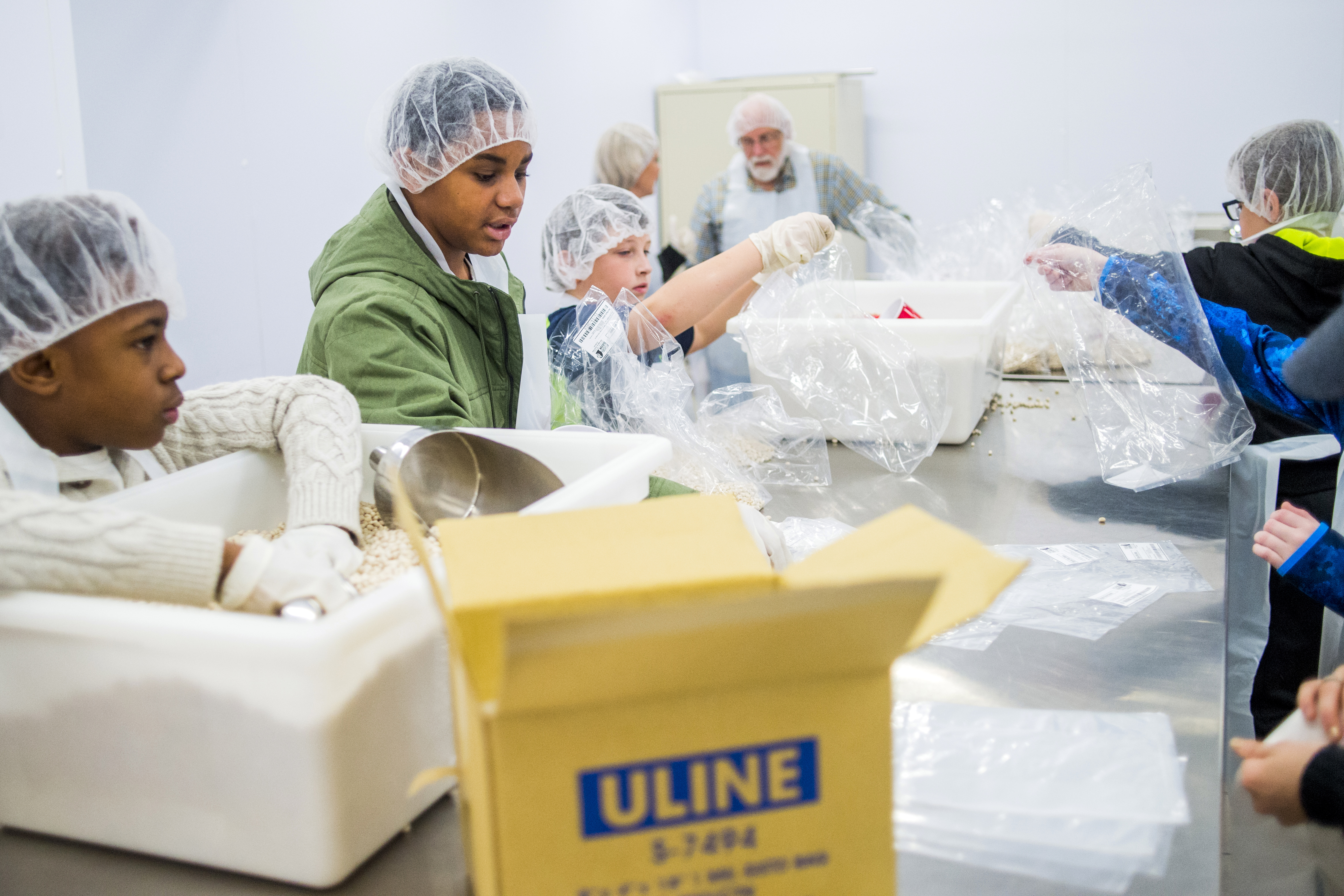 Students volunteer at Food Bank of Eastern Michigan, which aims at ...