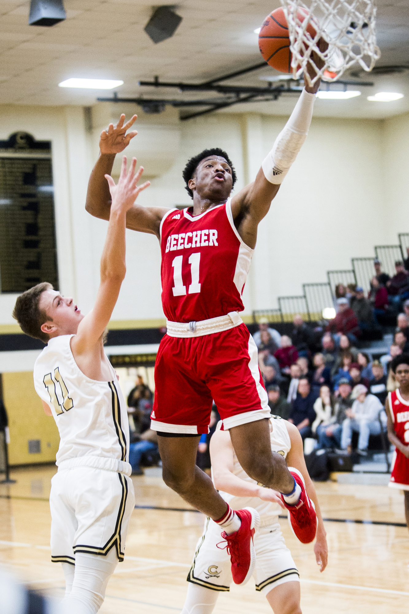 Beecher boys basketball continues to dominate, defeating Corunna 85-57 ...