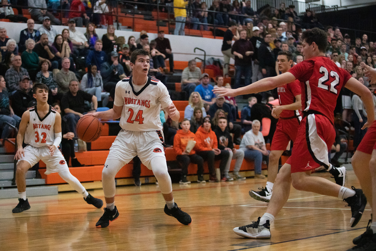 Clio boys basketball celebrates win on senior night