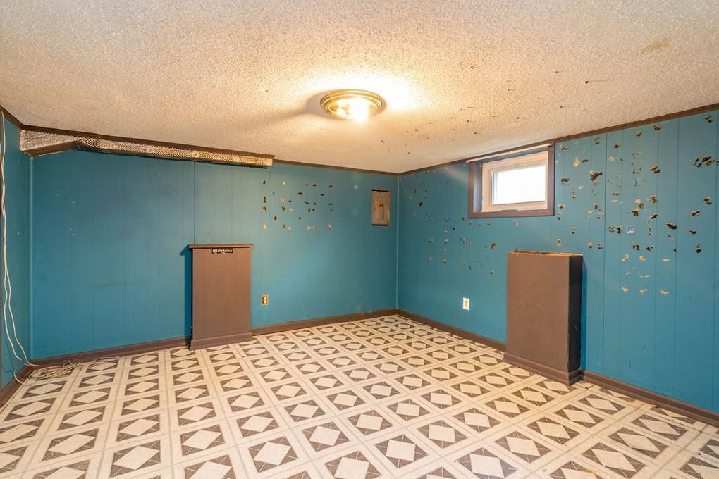 Page Boulevard home where bodies were found tied up on the market in