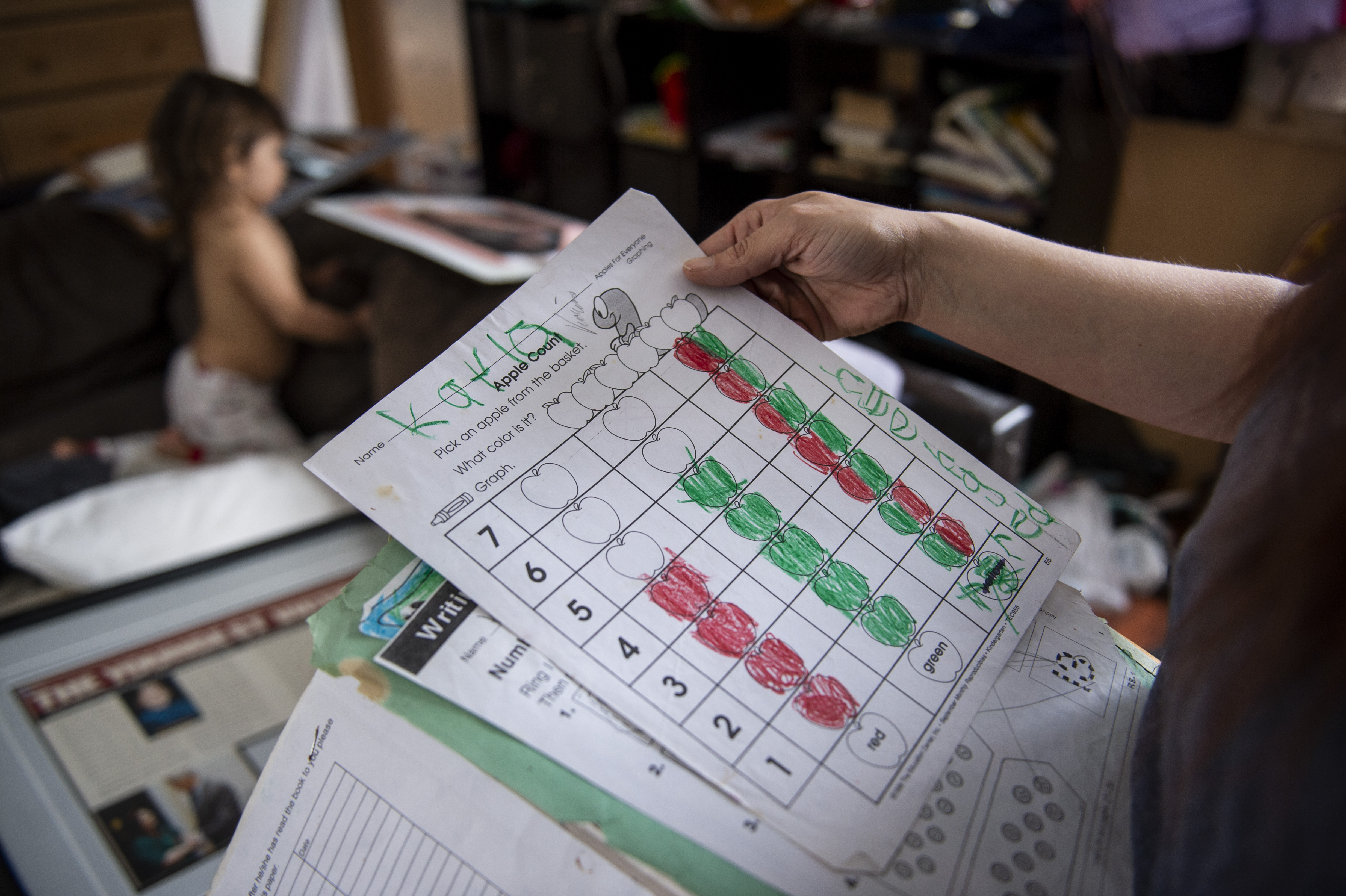 Elizabeth Krasinski still hangs onto her late sister's artwork in Tawas City on Thursday, Feb. 20, 2020. Elizabeth lost her sister, Kayla Rolland, 20 years ago in a school shooting when Rolland was only in first grade. In 2000, the story made national news as Rolland is amongst the youngest of school shooting victims.