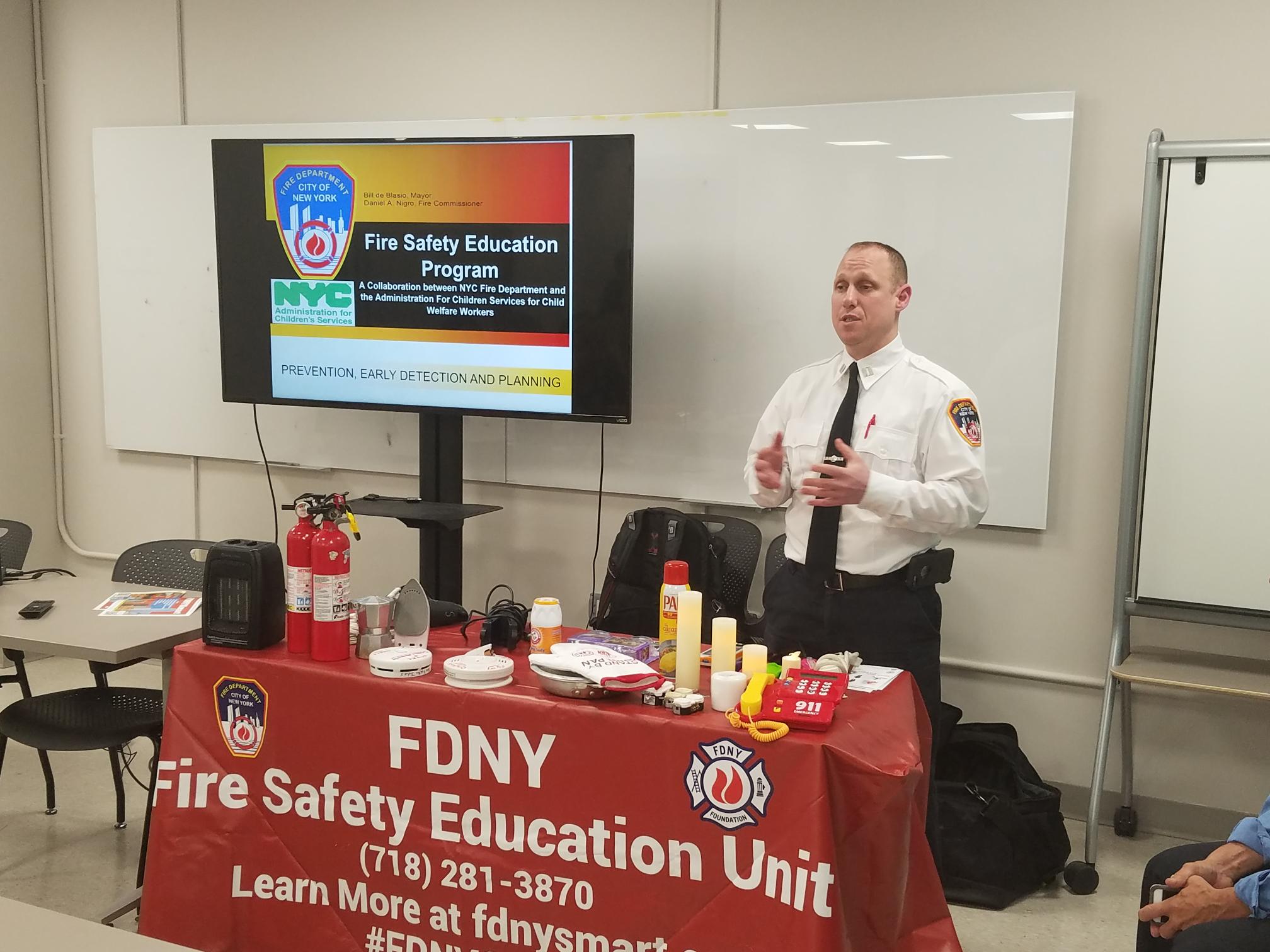 FDNY fire instructors teach fire safety education to ACS workers
