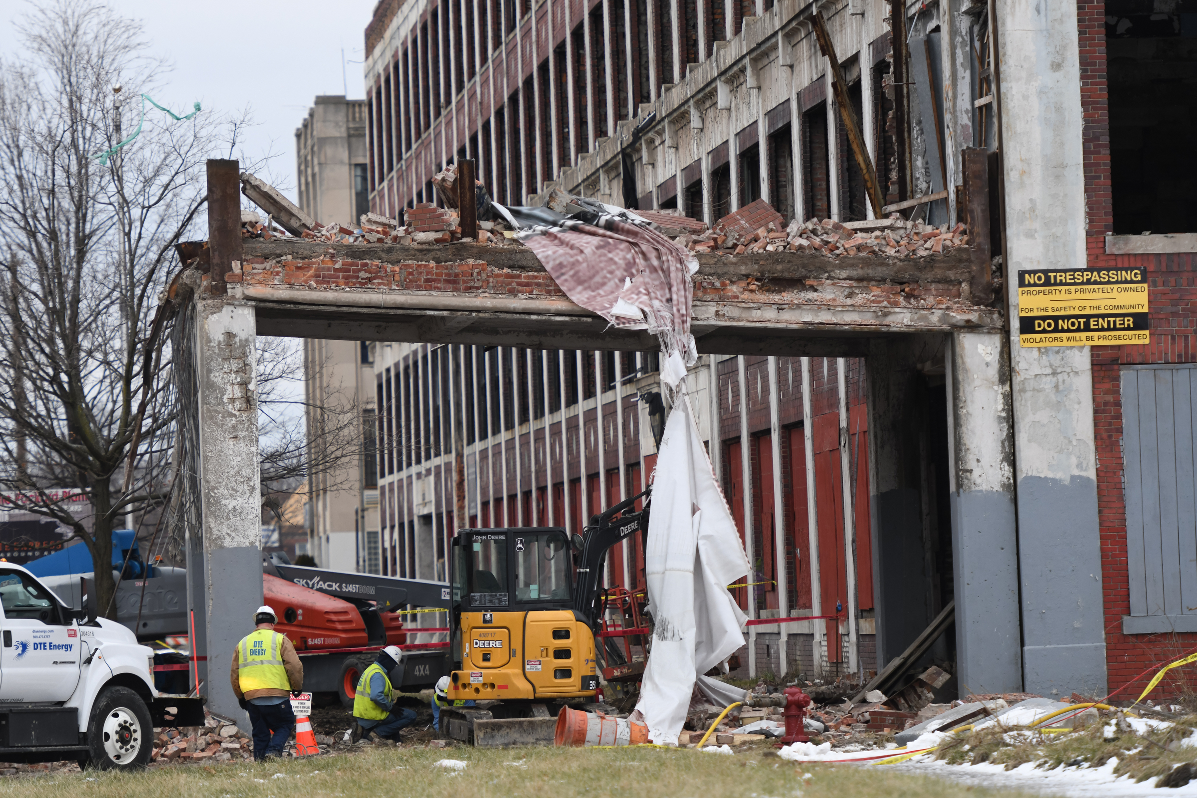Crews clear debris of historic Packard Plant bridge that