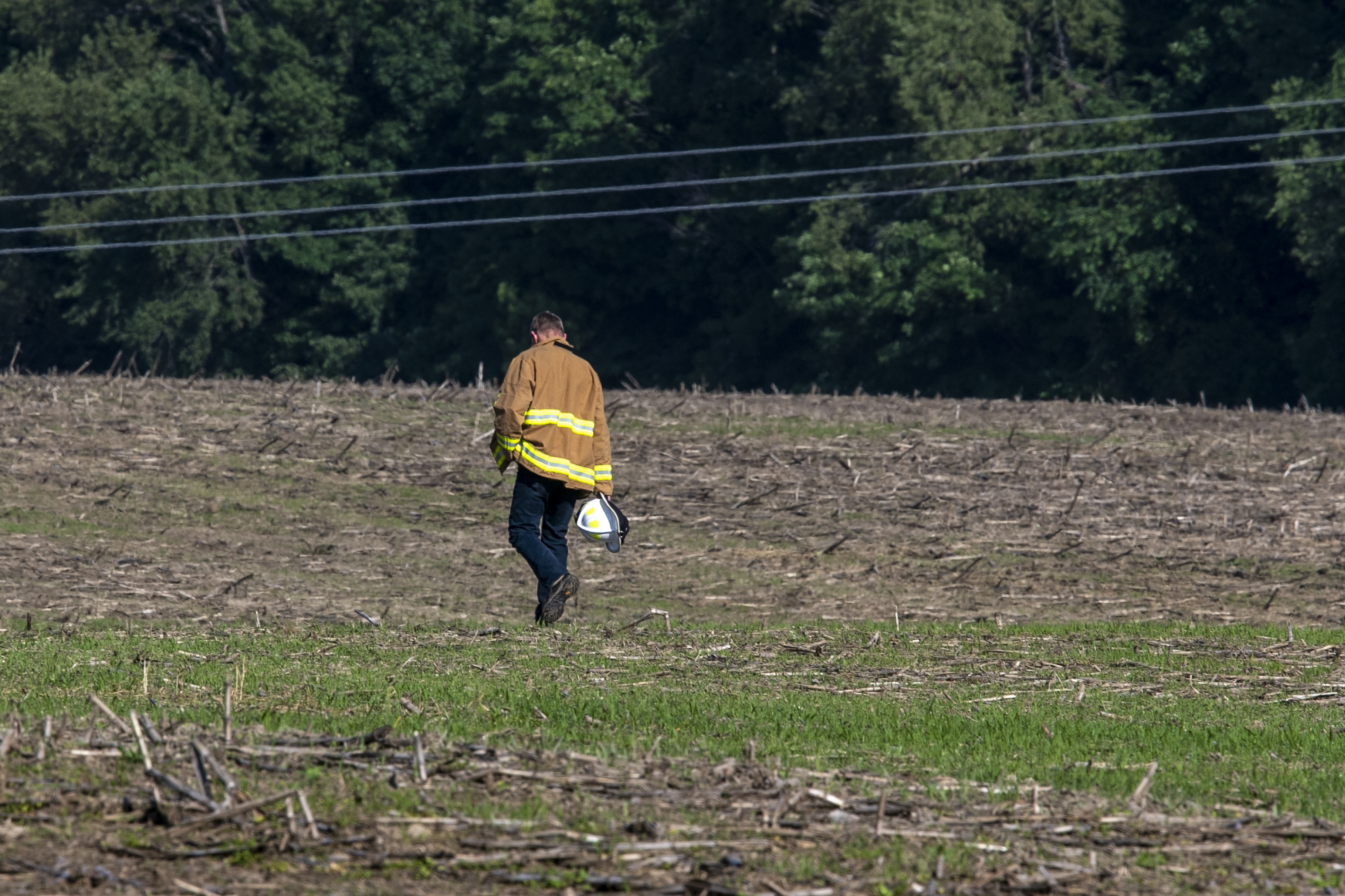 Farmer trapped after power lines fall on tractor - mlive.com
